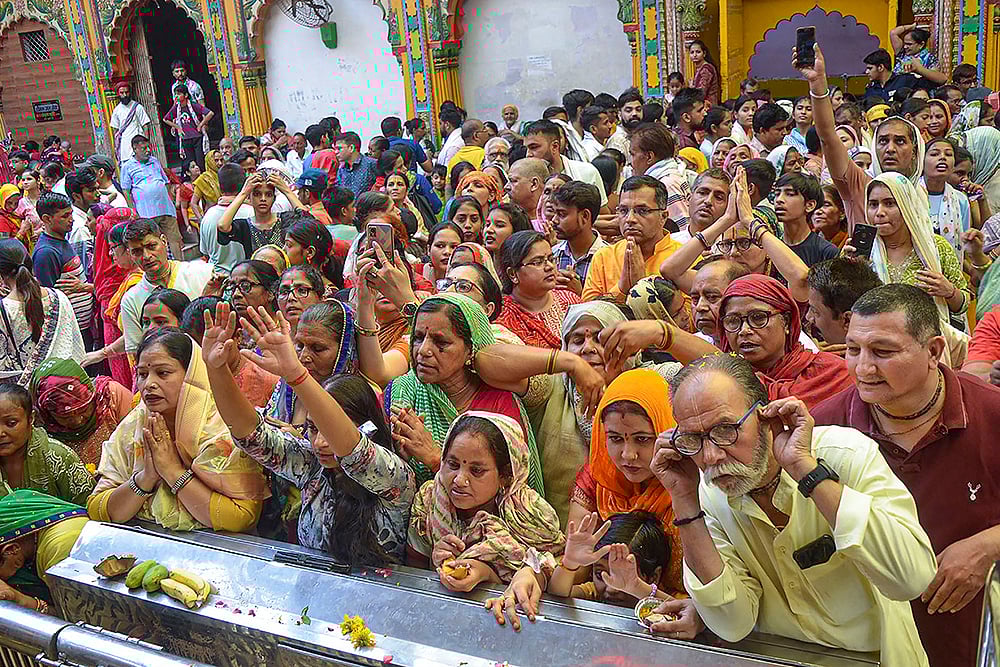 | Photo: PTI : 'Nirjala Ekadashi' at Dwarkadhish Temple, in Mathura